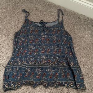 Blue floral spaghetti strap tank top from American Eagle.